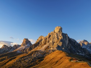 Passo di Giau at dusk, Giau Pass, in the back peaks of Ra Gusela, Nuvolau and Averau, Tofane on the