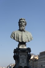 Bronze bust of artist and goldsmith Benvenuto Cellini on the Ponte Vecchio in Florence, Tuscany,