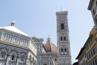 On the left Baptistery of San Giovanni, center dome of the Cathedral of Santa Maria del Fiore, on