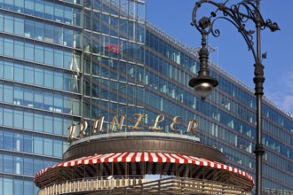 Café Kranzler with historic lantern and modern office building on Kurfürstendamm, Charlottenburg,