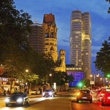 Budapester Straße with Kaiser Wilhelm Memorial Church and Upper West Tower in the evening,