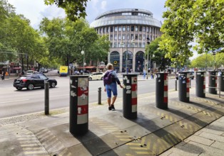 The podium of the Kaiser Wilhelm Memorial Church is secured from vehicle barriers due to the attack