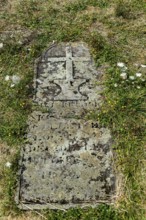 Auvergne Volcanoes Regional Natural Park, old cemetery tombstone at Pic Saint Pierre Saint Pierre