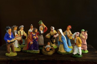 Traditional Provençal terracotta Santons figurines displayed for a crib in France showcasing local