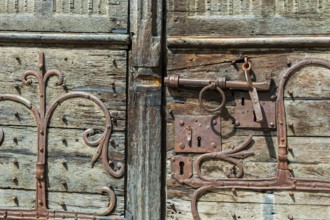 Ancient lock and mechanism of the Romanesque church of Mailhat in Puy de Dome, Auvergne Rhone