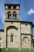 Mailhat village. Romanesque church with its square bell tower, Puy de Dome department,