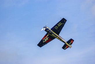 A Jakovlev Jak-55 with the registration LY-AGL during a flight demonstration as part of an air show