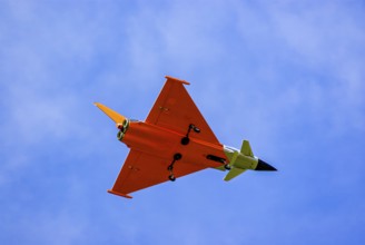An RC model of a Eurofighter Typhoon during a flight demonstration as part of an air show at the