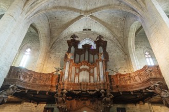 Organ loft of Saint Robert abbey. La Chaise Dieu. Haute Loire department. Auvergne-Rhone-Alpes,