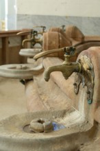 Vichy thermal city. Spring water taps in the Célesting spring (Source of Celestins), Allier