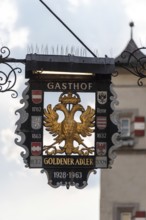 Traditional inn sign, Gasthof Goldener Adler in the historic centre of Innsbruck, Tyrol, Austria