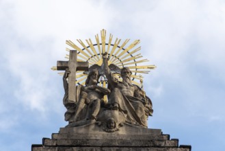 Statue of the Holy Trinity on the façade of St Jakob's Cathedral, Innsbruck, Tyrol, Austria