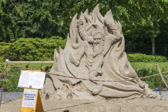 Sand sculpture with barrier, fairytale figure of Rumpelstiltskin, garden show, Bad Lippspringe,