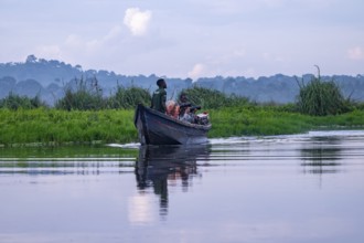 Boat with tourists in Mabamba Swamp, tourists photographing birds, Mabamba Swamp, Lake Victoria,