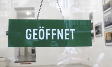 Open sign in the window of an art gallery, Berlin, 05.10.2025, Berlin, Berlin, Germany