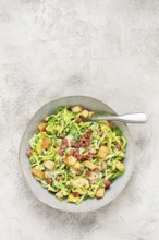 Brussels sprouts Caesar salad, with bacon and croutons, healthy food, homemade, no people