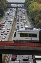 S-Bahn S28 crosses the A3 motorway between the Hilden junction and the Mettmann junction, view to