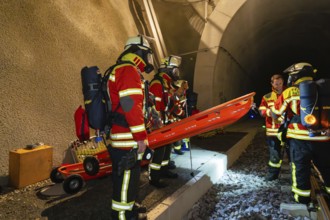 Firefighters prepare rescue in the tunnel with stretcher, firefighting exercise in the new tunnel