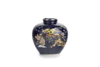 Dark blue Chinese vase with ornate decoration, white background