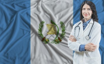 Guatemalan medicine and healthcare concept. Doctor close up against Guatemala flag background
