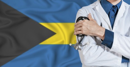 Bahamas healthcare concept. Doctor with stethoscope on Bahamas flag. Doctor holding stethoscope on