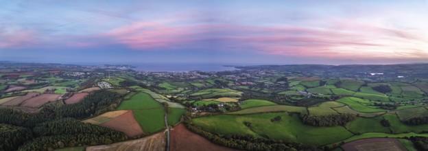 Twilight Sky of Torbay farms and fields from a drone, Totnes, Berry Pomeroy, Devon, England, United