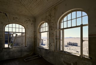 View into the desert from a former dwelling house, Kolmanskuppe, near Lüderitz, Karas Region,