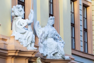 Statues above the entrance door at the Romanus House, Brühl, Leipzig, Saxony, Germany