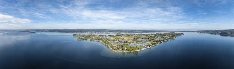 Aerial view panorama of the island of Reichenau in Lake Constance, on the left on the horizon the
