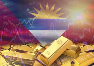Gold bars on Antigua and Barbuda flag in background. Gold bars stacked on Antiguan flag. Concept of