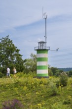 Lighthouse on an island on Lake Kemnader, people on the island, Heveney, Witten, Ruhr area, North