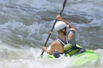 Kayak surfing in whitewater, Pacuare river, Turrialba, Costa Rica, Central America