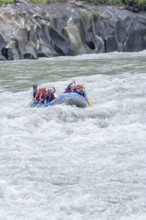 A group of people white water rafting, Costa Rica, Central America