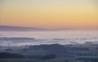 Wind turbines rise out of the fog at sunrise, Kirnberg an der Mank, Lower Austria, Austria