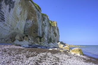 Cliffs on the beach at Valleuse d'Etigue, hike from Yport to Etretat along the chalk cliff coast,
