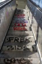 Escalator in a suburban railway station, full of graffiti, Day, Düsseldorf, North Rhine-Westphalia,