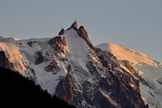 From left: snow-covered Aiguille du Midi, Mont-Blanc, Chamonix-Mont-Blanc, Haute-Savoie, France