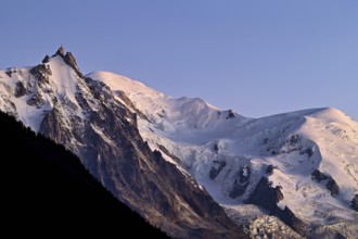 From left snow-covered Aiguille du Midi, Mont-Blanc, Vallot Hut, Dome du Goûter,