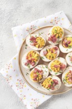 Spicy, stuffed ramen eggs, with bacon and green onions, homemade, no people