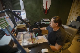 Porcupine, South Dakota - Lucian Little White Man broadcasts on KILI Radio, the voice of the Lakota