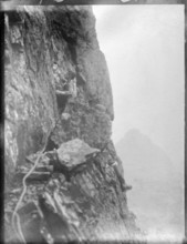 Climber on rocks, Cuillin mountains, Skye, Scotland, UK c 1900-1920