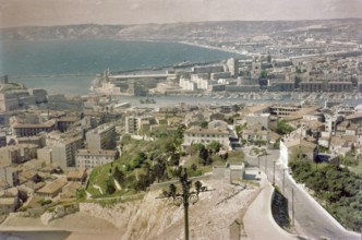 Oblique angle raised view of city centre and port, Vieux Port, Old Port, City of Marseille, France,