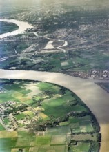 Captioned as 'aerial photo Saigon', meandering river in flat agricultural landscape of paddy
