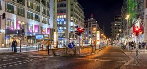 Night shot of Friedrichstraße at the railway station with a view of the tram stop and the