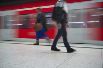 Underground arriving S-Bahn, train, class 420 in traffic red, platform, stop, Stadtmitte station,
