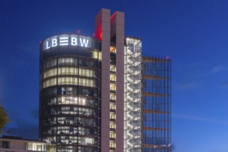 Building in the evening. Landesbank Baden-Württemberg on Heilbronner Straße. The bank's logo on the