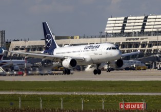 Flight operations at Stuttgart Airport with terminal. Aircraft on landing. Aircraft registration