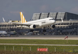 Flight operations at Stuttgart Airport with terminal. Aircraft on landing. Aircraft registration