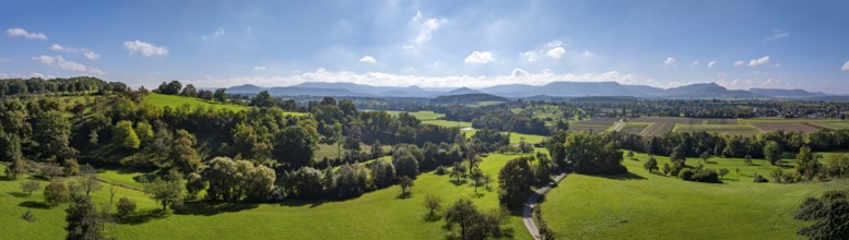 Landscape in autumn near Jesingen. The mountains of the Swabian Alb in the background. Drone photo.
