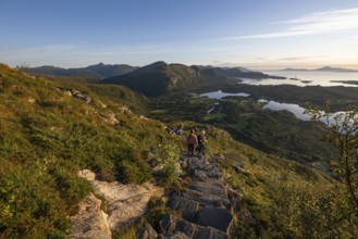 Hikers on the Rørsethornet stone staircase, with 3292 steps one of the longest continuous stone